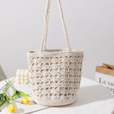 Sac à bandoulière en paille tissé à la main en fil de coton découpé et creux coréen élégant sac à bandoulière en paille portable sac de plage de vacances en bord de mer